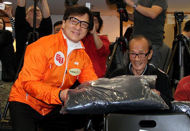 Jackie Chan delivers a jacket.