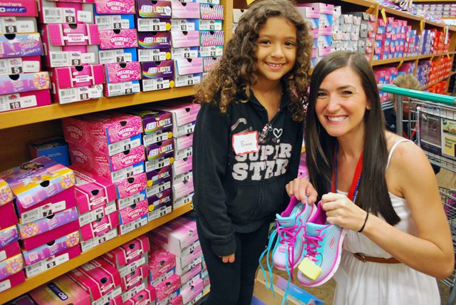 Mackenzie Neitling and Bianca pick out the perfect pair of shoes during their back-to-school shopping.