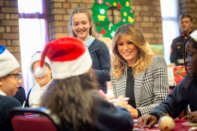 Melania Trump Helping Children Wrap and Decorate Presents