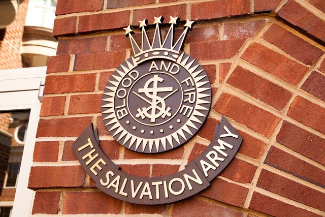 Salvation Army crest on brick wall
