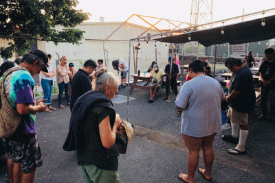 group praying outside