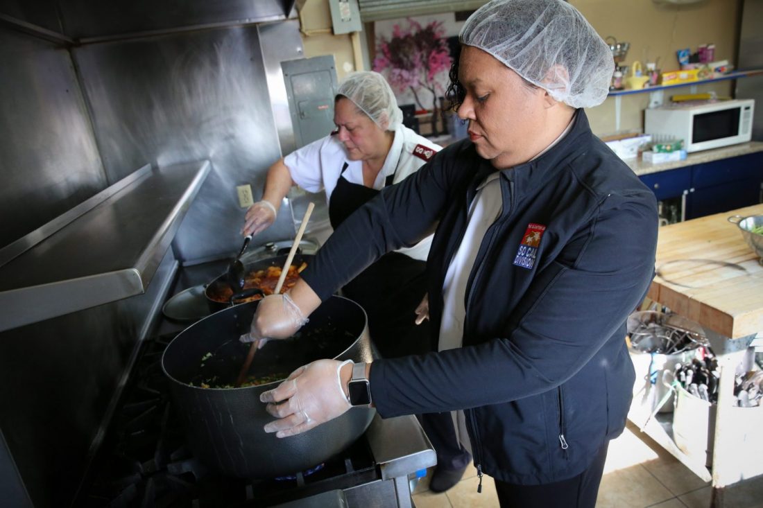 Salvation Army workers preparing food