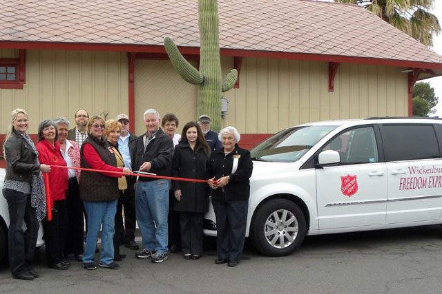 Ribbon Cutting in front of "Freedom Express" van